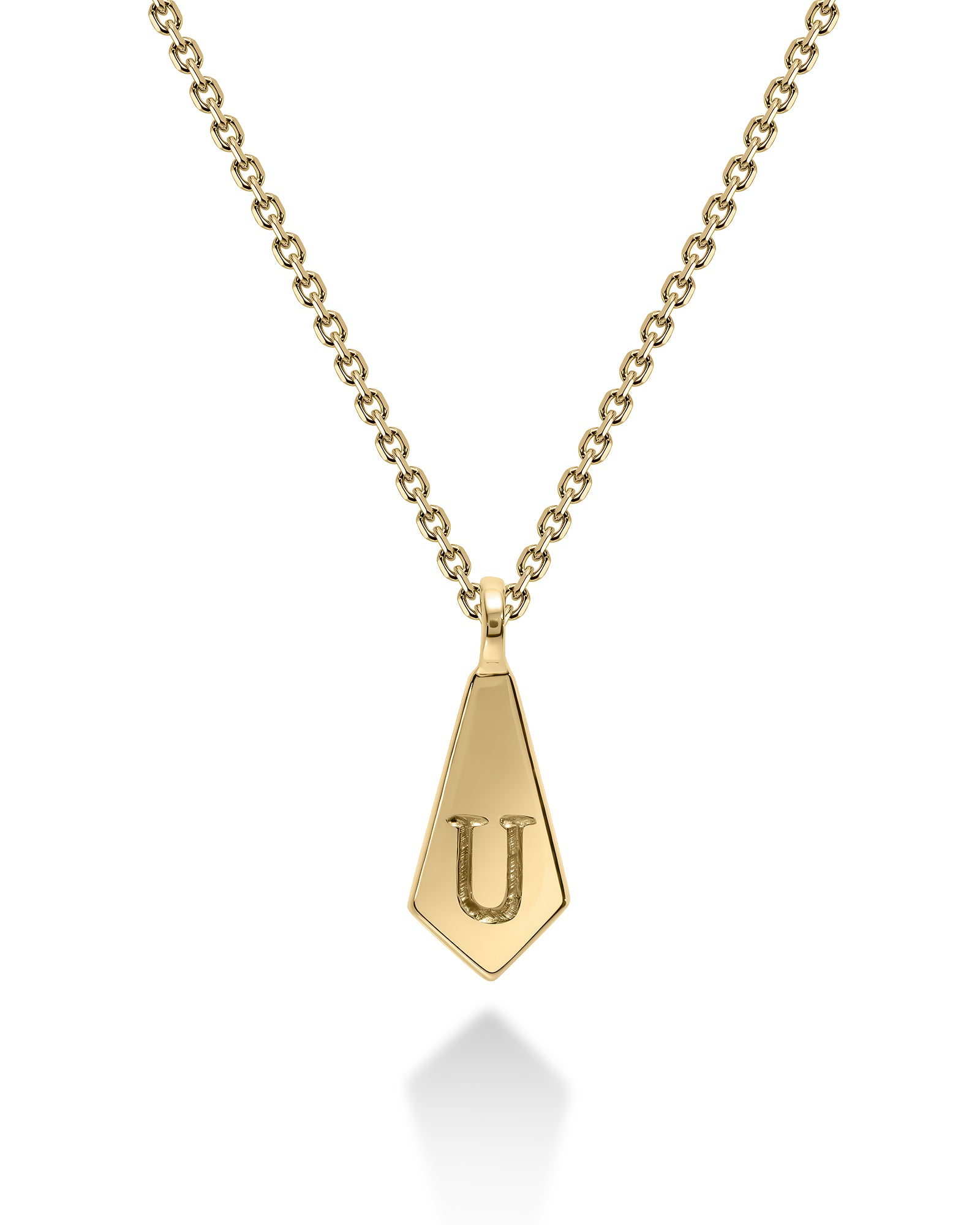 A gold initial pendant necklace featuring a faceted, diamond-shaped pendant engraved with the letter 'U', suspended from a delicate gold cable chain on a white background.