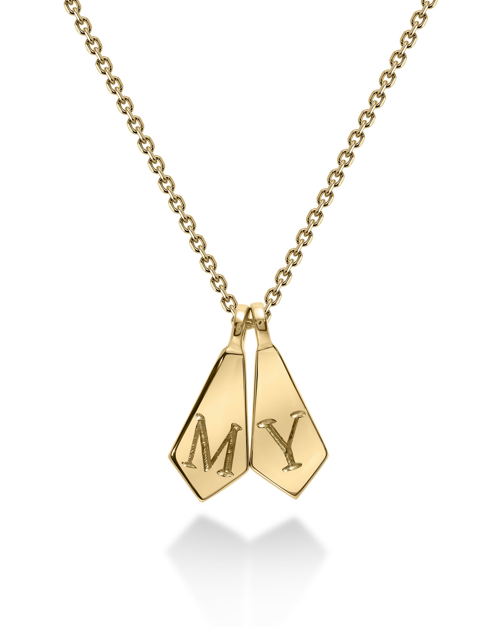 A gold initial necklace featuring two diamond-cut pendant tags engraved with the letters 'M' and 'Y', suspended from a delicate gold chain on a white background.