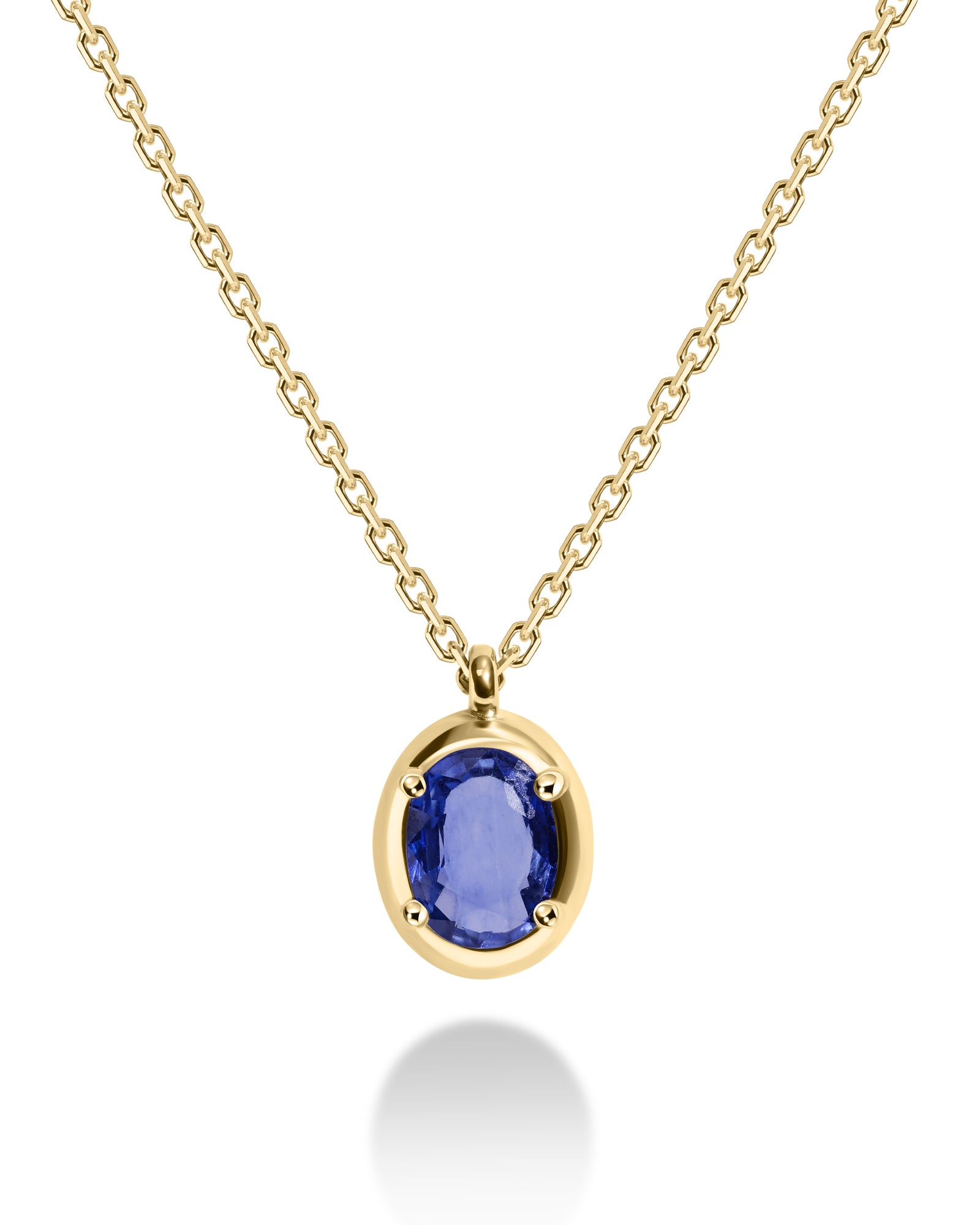 Gold necklace with a blue gemstone pendant on a white background