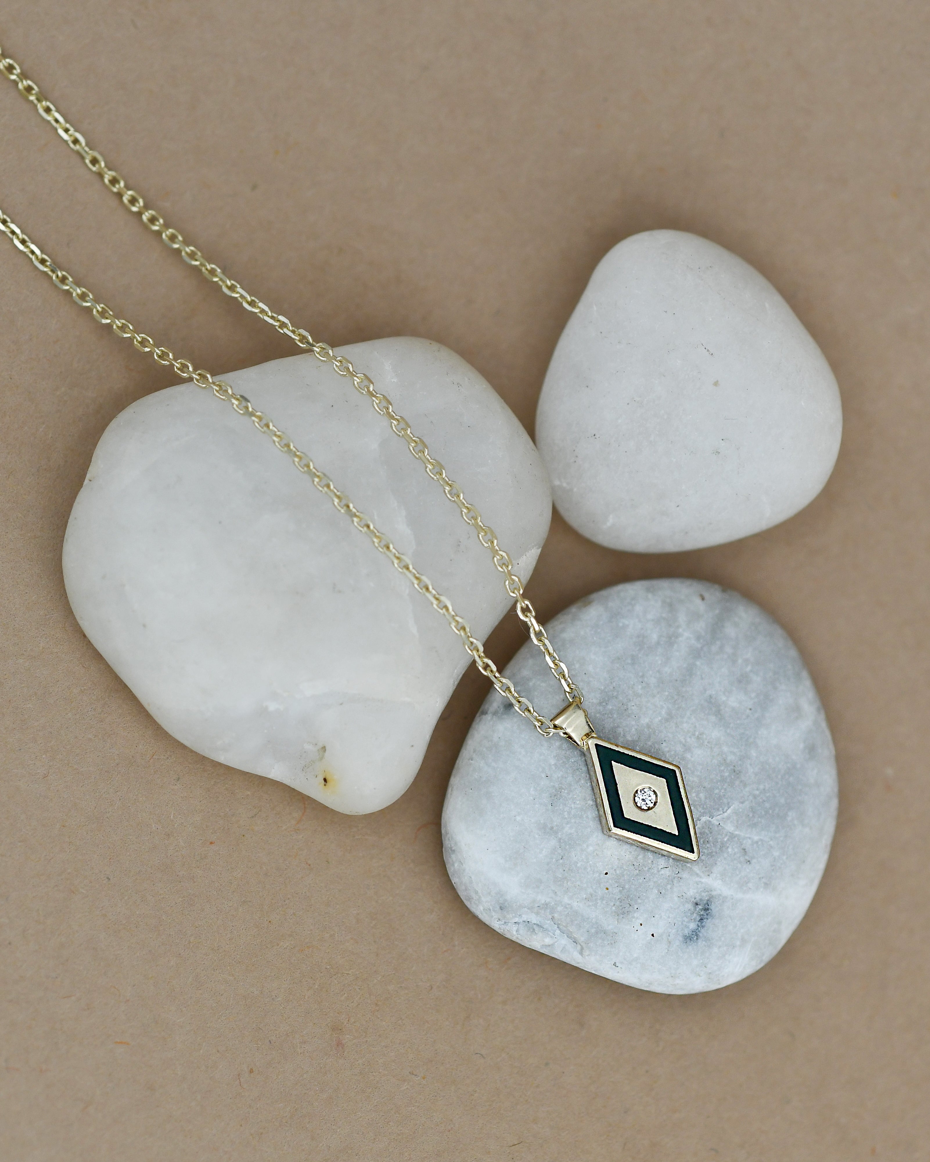 Gold necklace with a diamond pendant