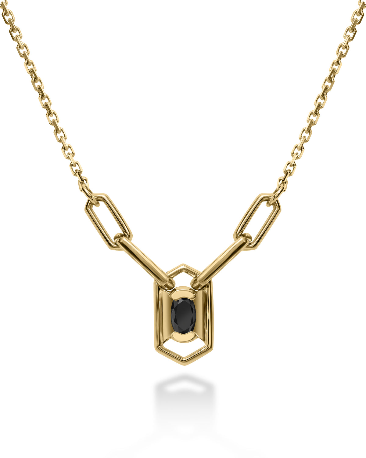Gold necklace with a black diamond pendant 