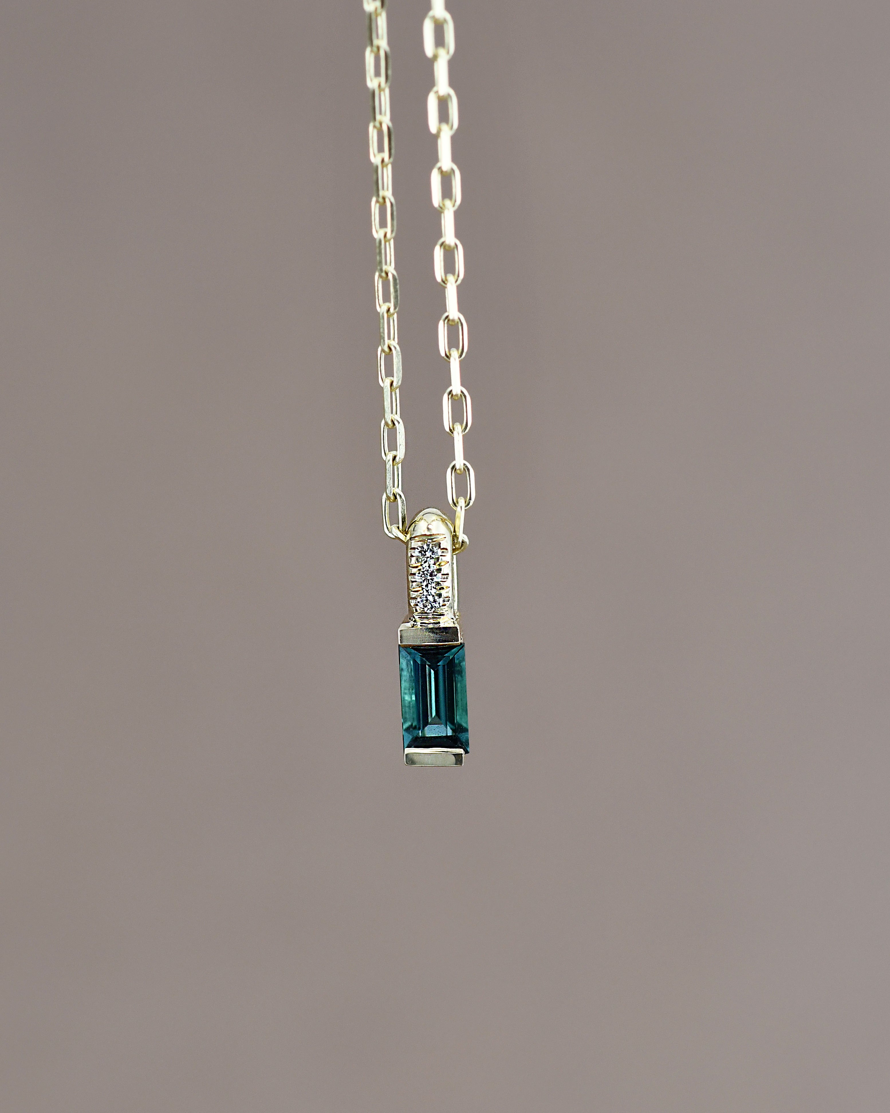14k gold necklace with blue pendant