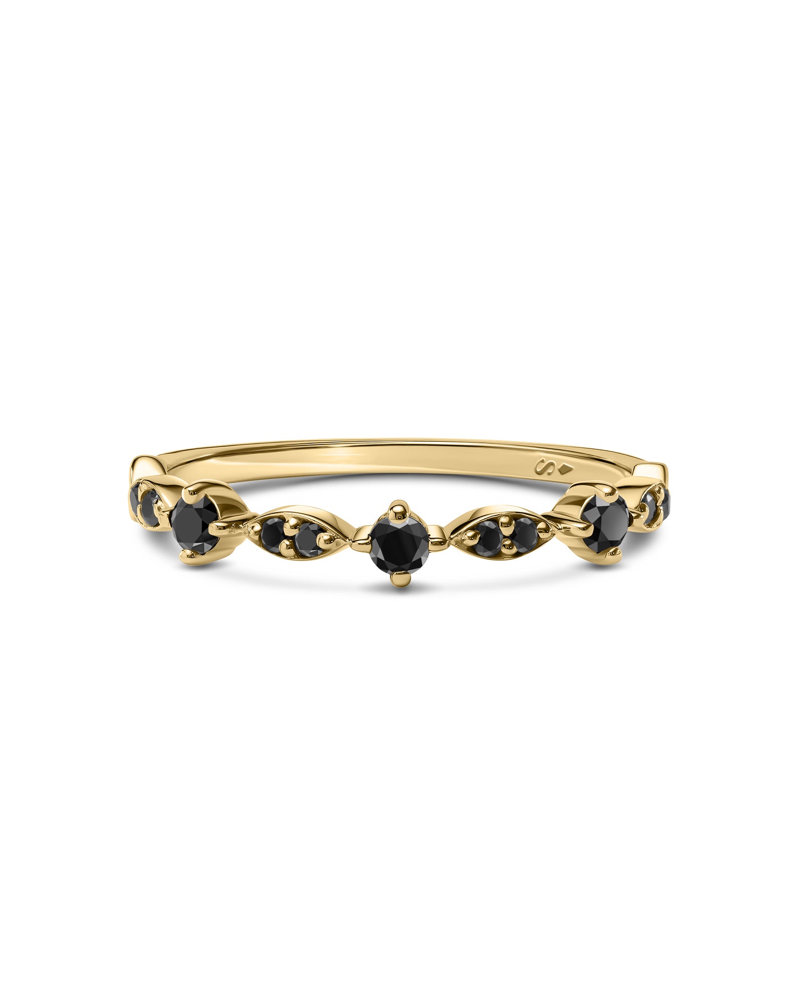 Gold ring with black diamonds on a white background