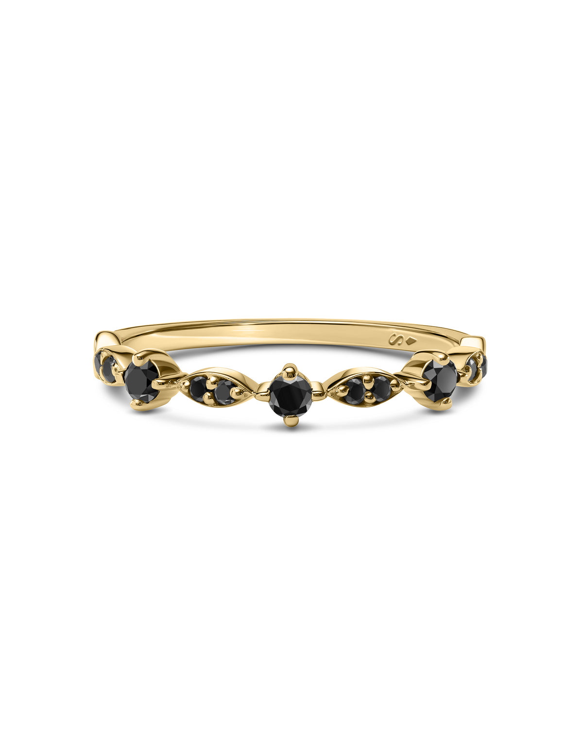 Gold ring with black diamonds on a white background