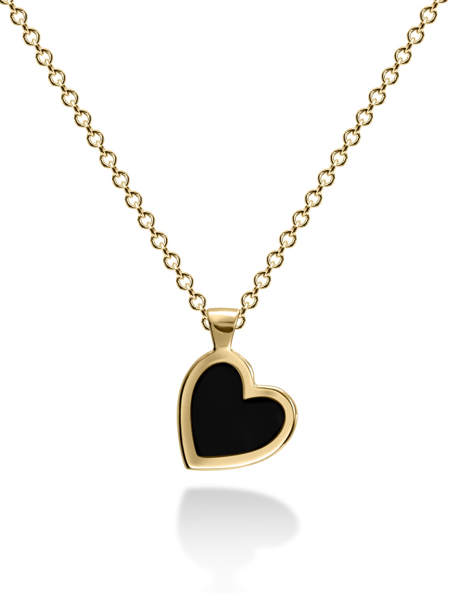 Gold necklace with a black heart pendant on a white background