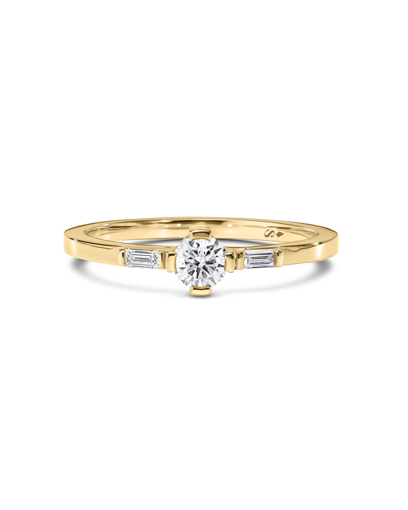 Gold ring with diamonds on a white background