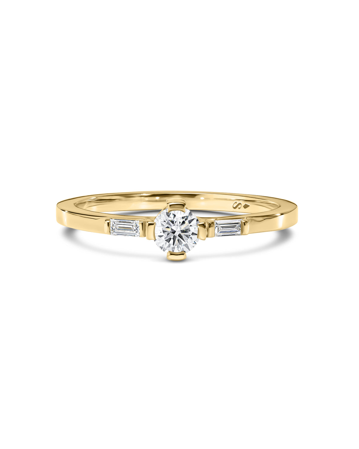 Gold ring with diamonds on a white background