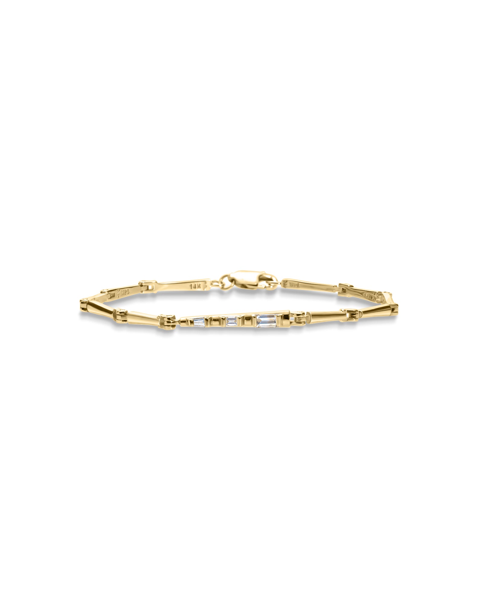 A gold bracelet with white diamond saccents, displayed against a white background.