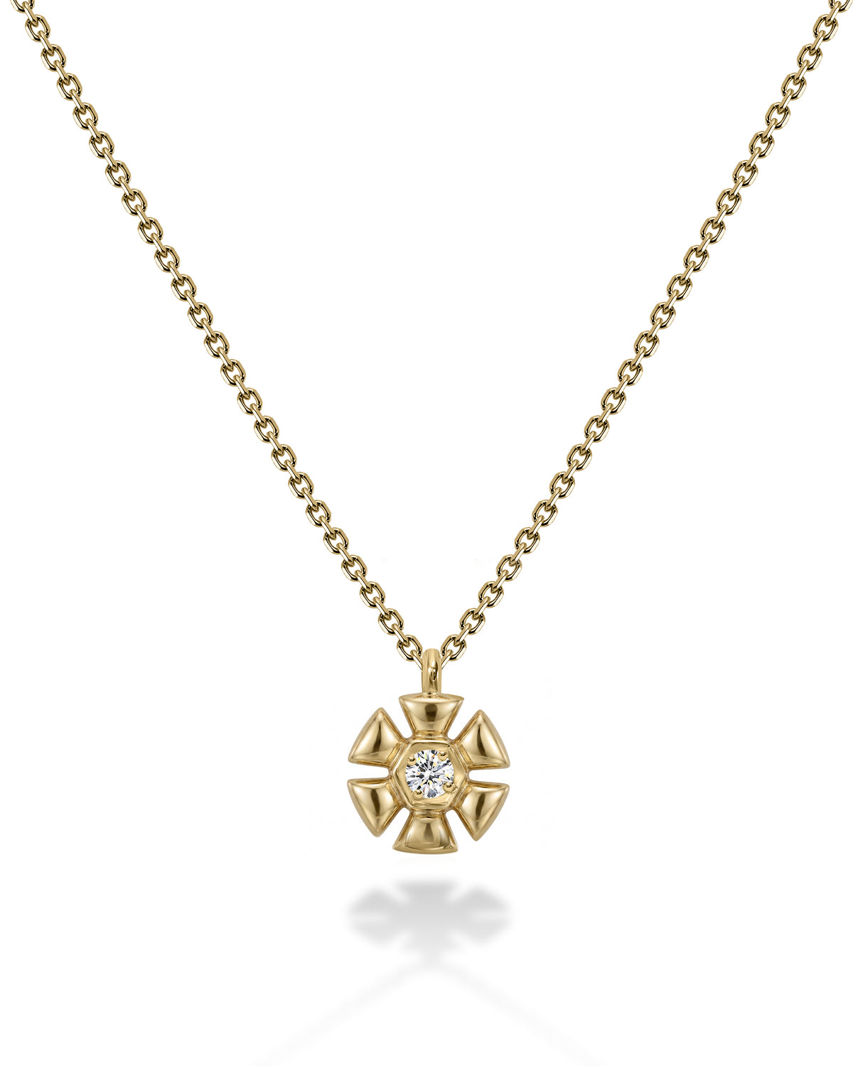 14k gold necklace, flower shape with clear white diamond in the center