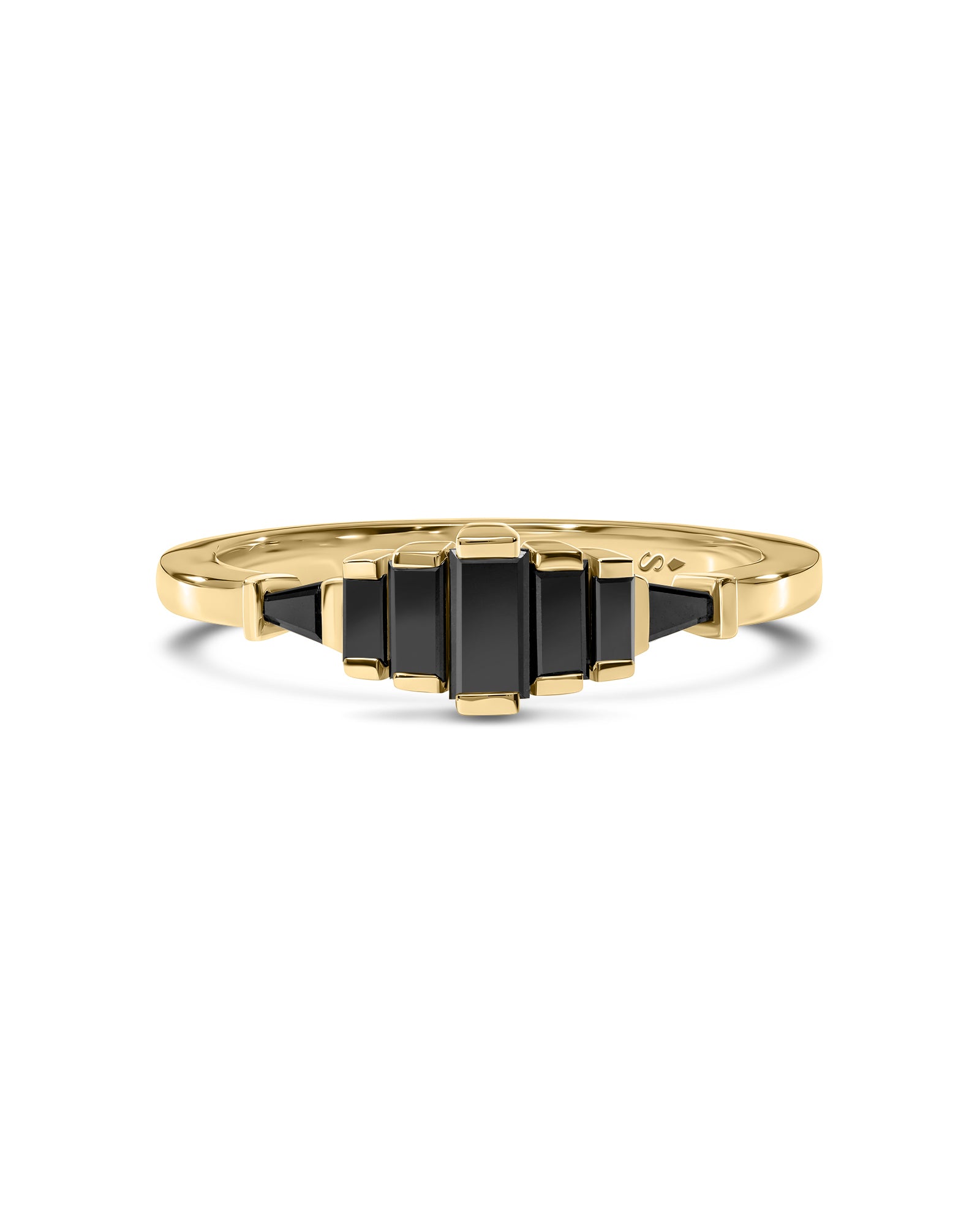 Gold ring with black diamonds on a white background