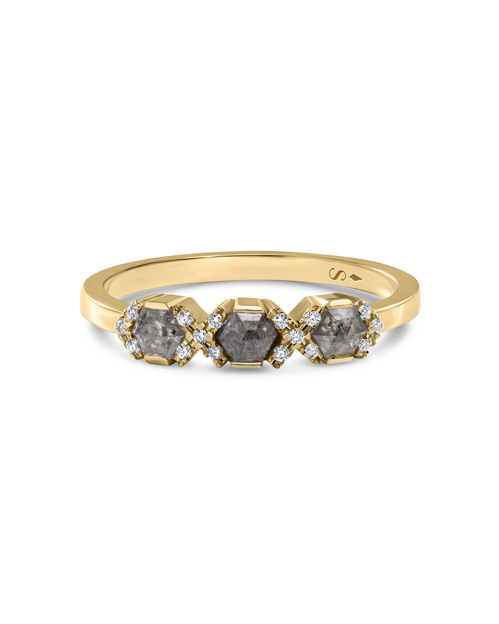 A yellow gold ring featuring three large, textured gray rose-cut center diamonds, each accented by small clear diamonds on either side, set against a plain white background.