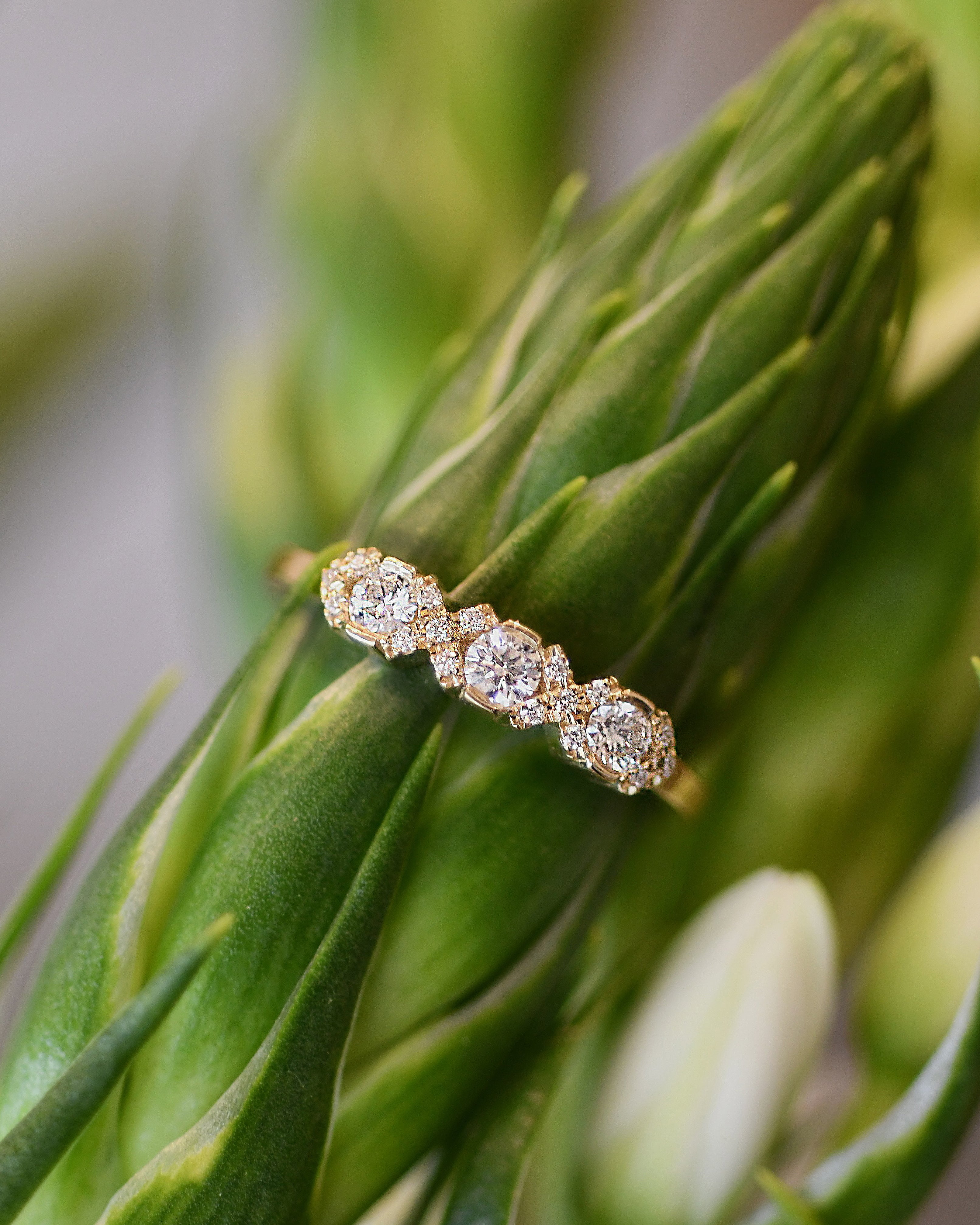 gold ring with white diamonds 