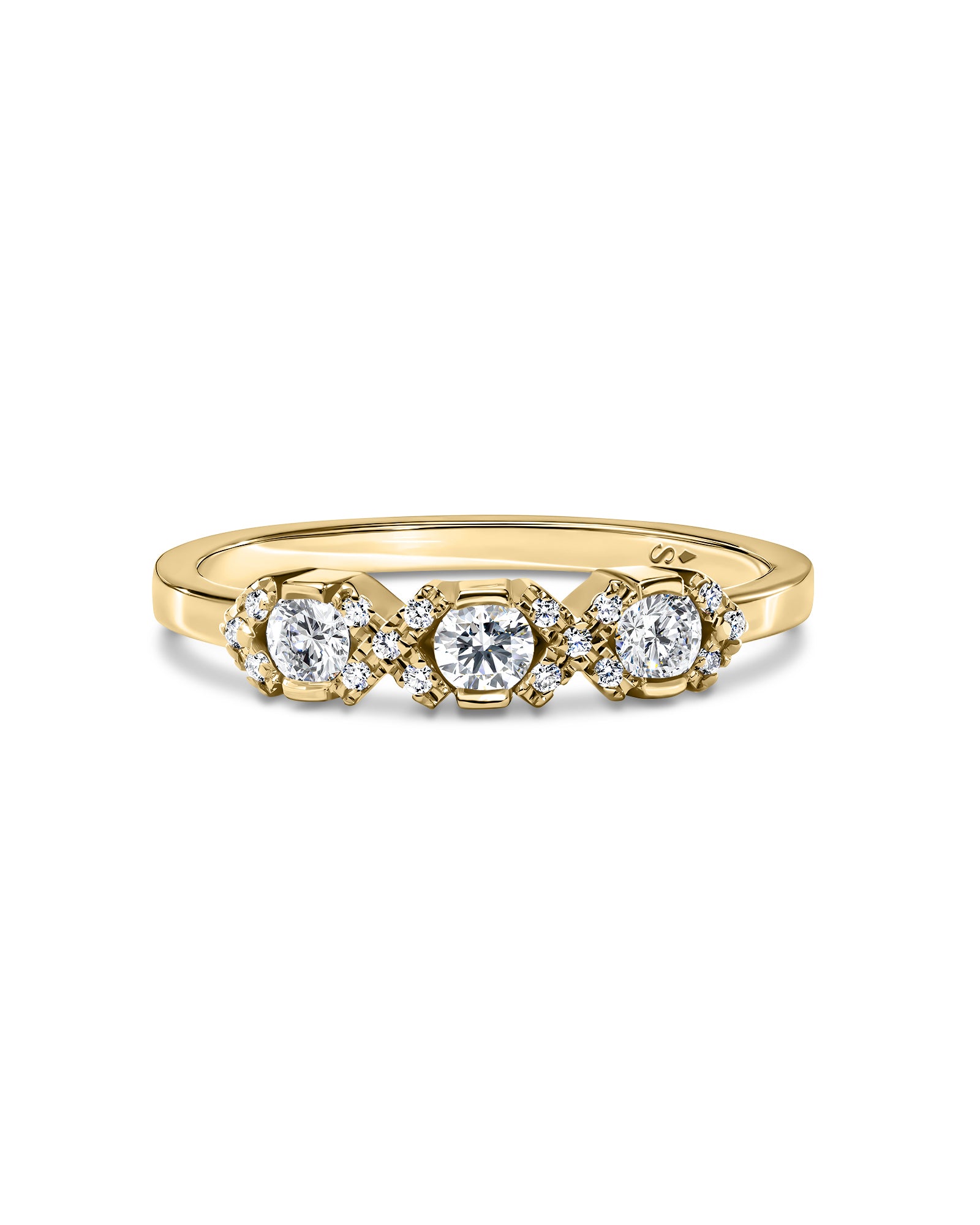 Gold ring with diamonds on a white background